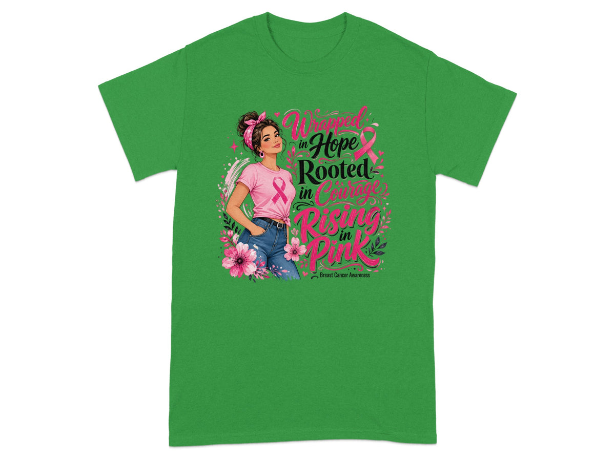 Woman wearing pink ribbon shirt with text: "Wrapped in Hope, Rooted in Courage, Rising in Pink".