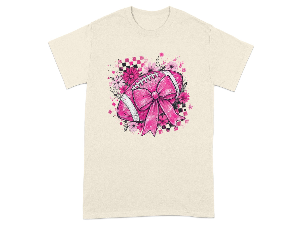 Pink football with bow and flowers on a light-colored t-shirt.