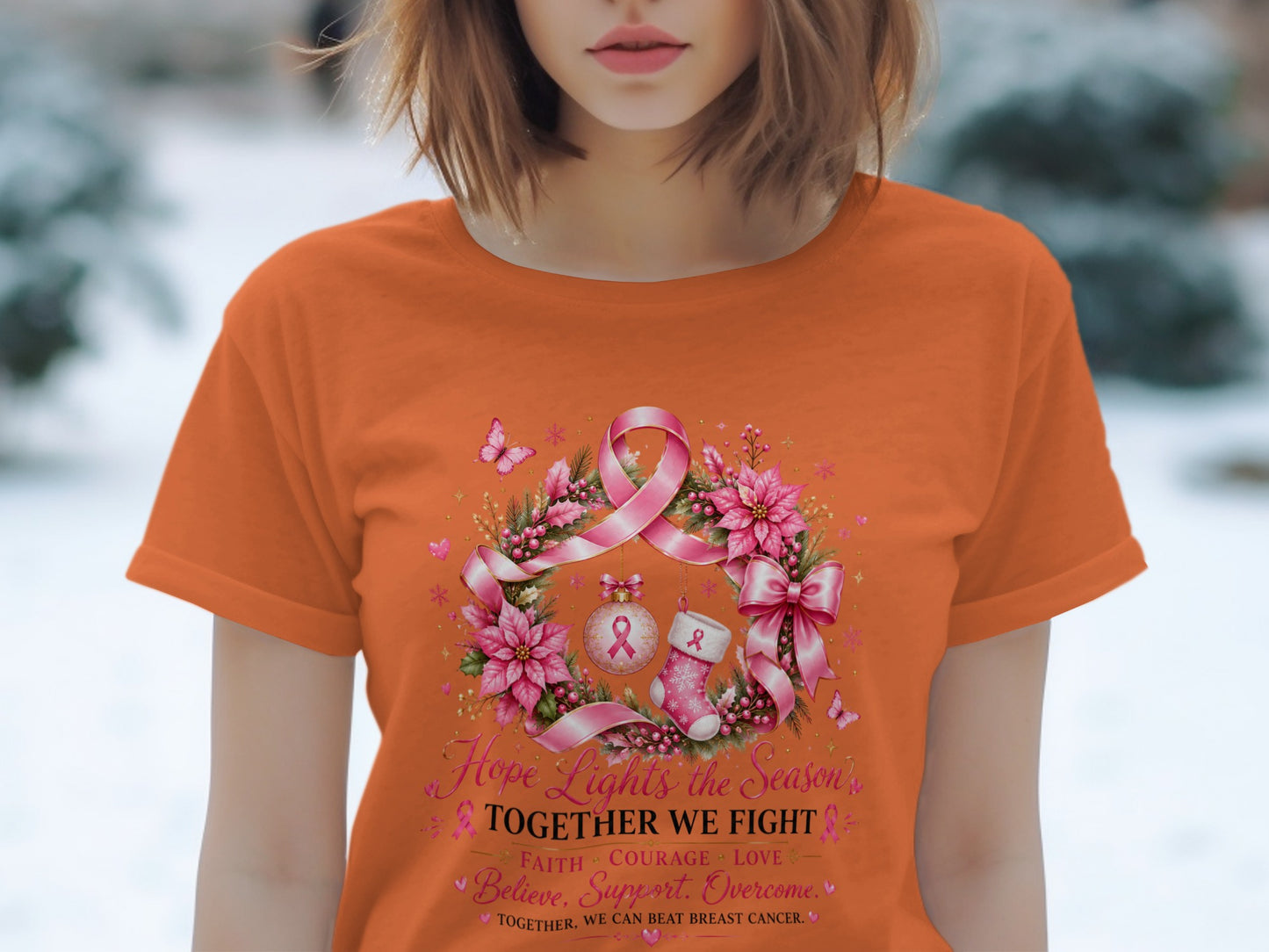 Orange t-shirt with breast cancer awareness design: "Hope Lights the Season, Together We Fight."