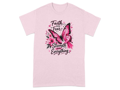 Pink t-shirt with a butterfly, flowers, and text: "Faith over Fear," "Strength over Everything."