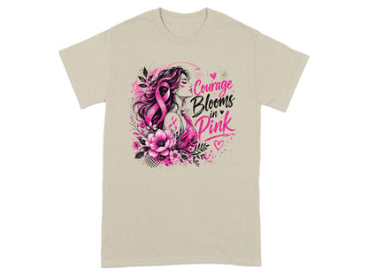 T-shirt graphic with woman, pink ribbon, flowers, and text "Courage Blooms in Pink."