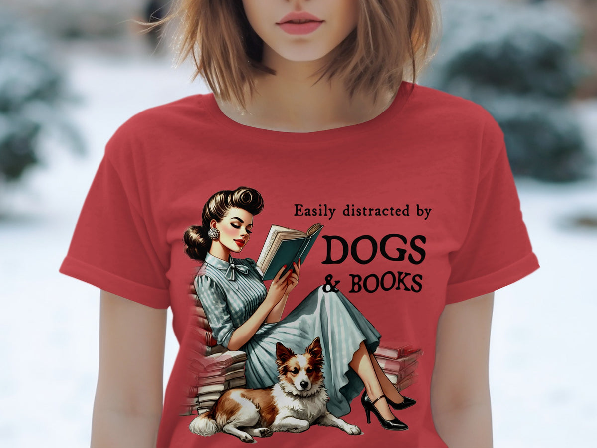 Red t-shirt with retro woman reading book next to dog and text "Easily distracted by DOGS & BOOKS."