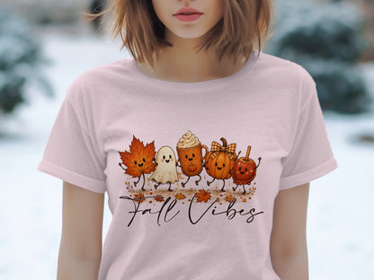T-shirt with a "Fall Vibes" graphic of cartoon fall characters and leaves.