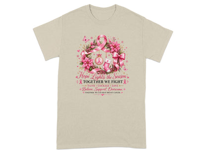 Light beige t-shirt with pink wreath, ribbon, and breast cancer awareness text.