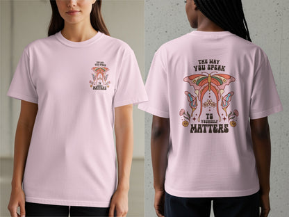 Pink t-shirt with butterfly graphic and text "THE WAY YOU SPEAK TO YOURSELF MATTERS".