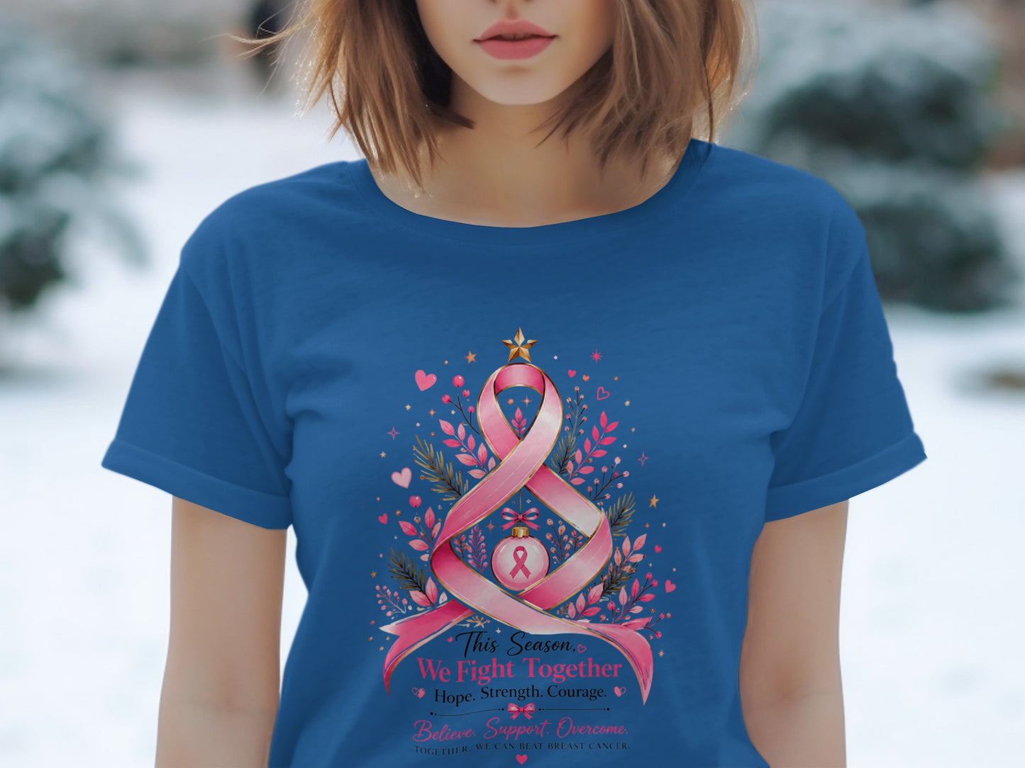Blue t-shirt with pink ribbon tree design and breast cancer awareness text.