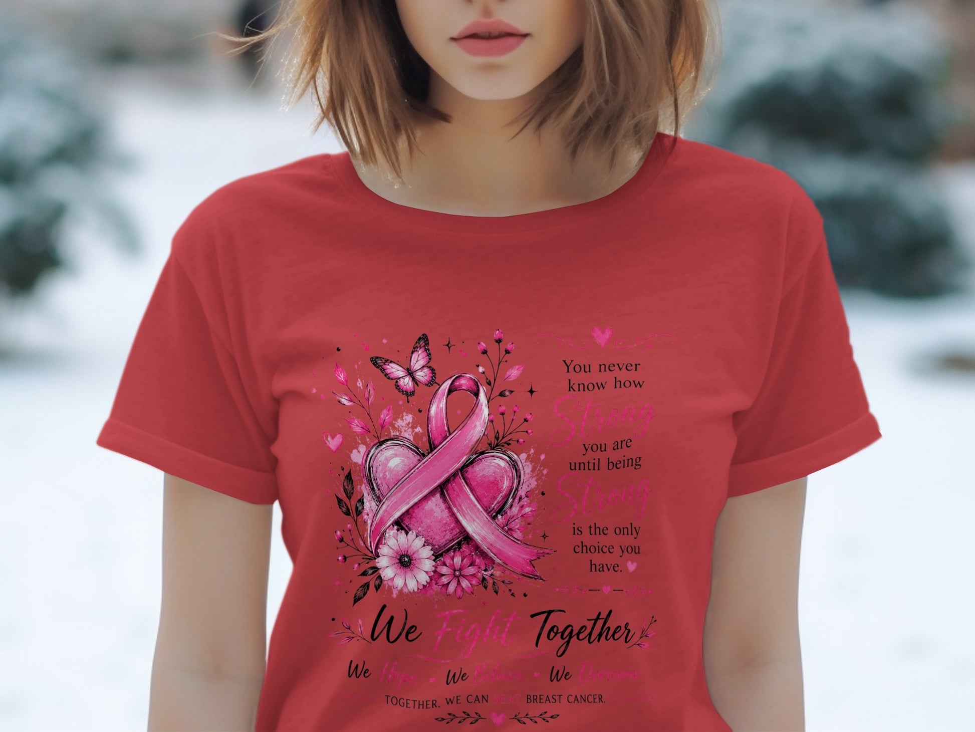 Red t-shirt with pink breast cancer ribbon design and inspirational text.