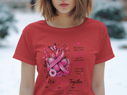 Red t-shirt with pink breast cancer ribbon design and inspirational text.