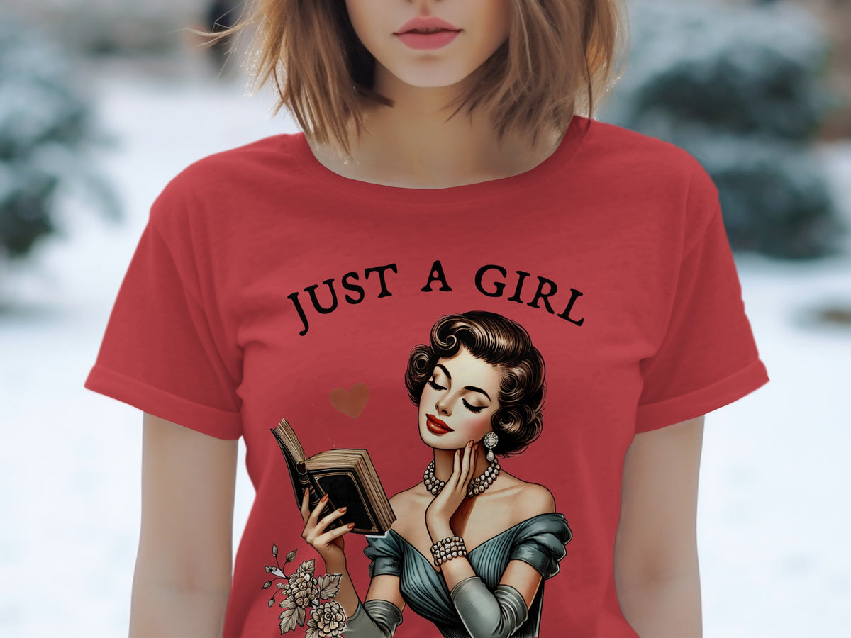Red t-shirt with "Just a Girl" text and vintage woman reading a book.