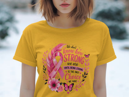 Yellow t-shirt with pink breast cancer ribbon, flowers, feathers, butterflies, and motivational text.