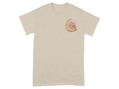 T-shirt with crescent moon, flowers, stars, and text reading "Take a moment to breathe."