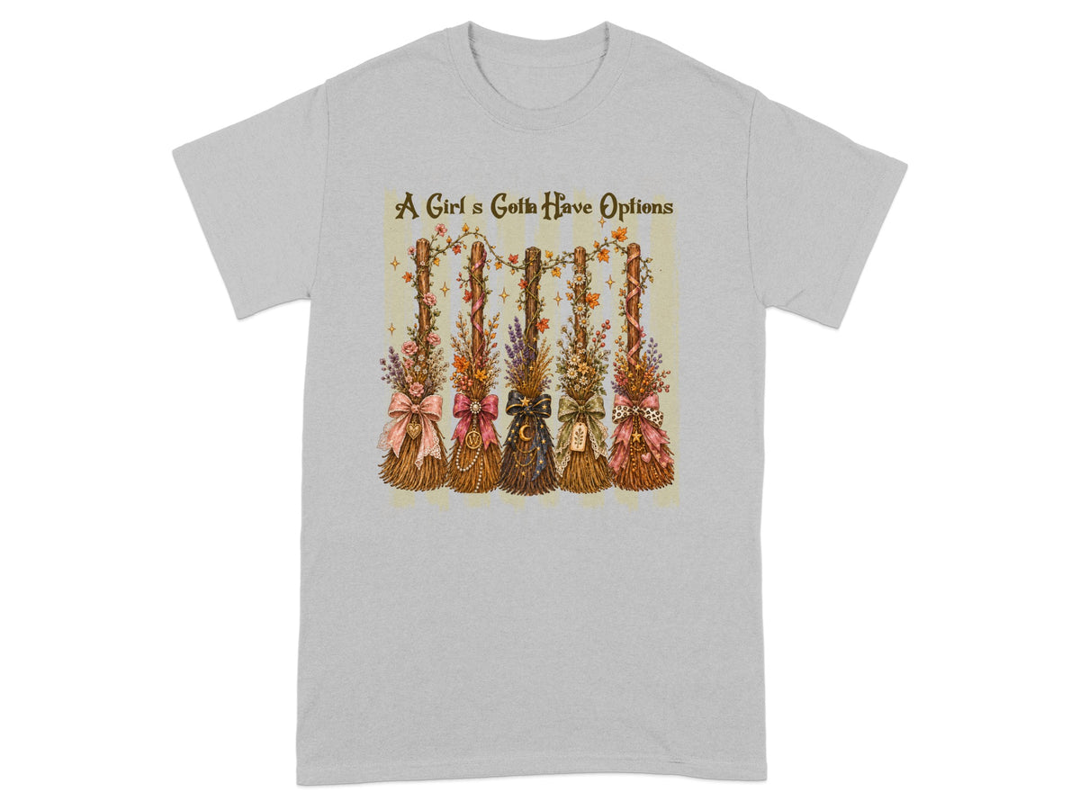 Five decorative brooms with flowers and bows, text reads "A Girl's Gotta Have Options".