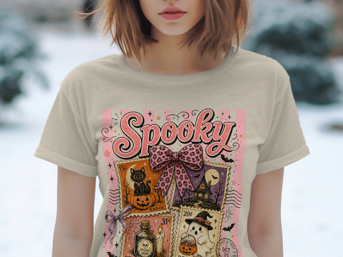T-shirt with vintage Halloween stamps featuring a black cat, haunted house, and ghost.