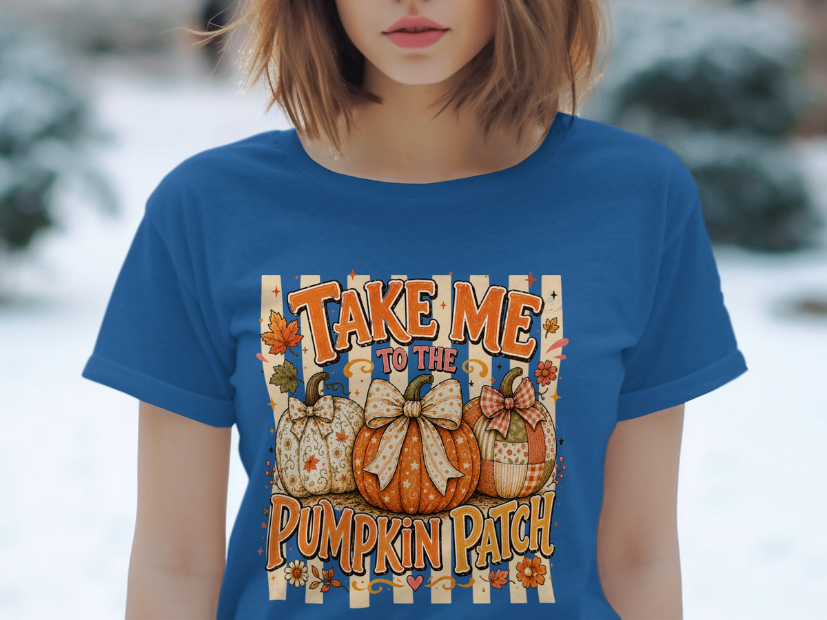 "Take Me to the Pumpkin Patch" text with three decorated pumpkins on a blue t-shirt.