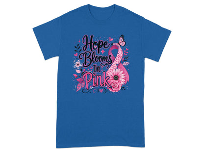 Blue t-shirt with pink breast cancer ribbon, flowers, and text "Hope Blooms In Pink".