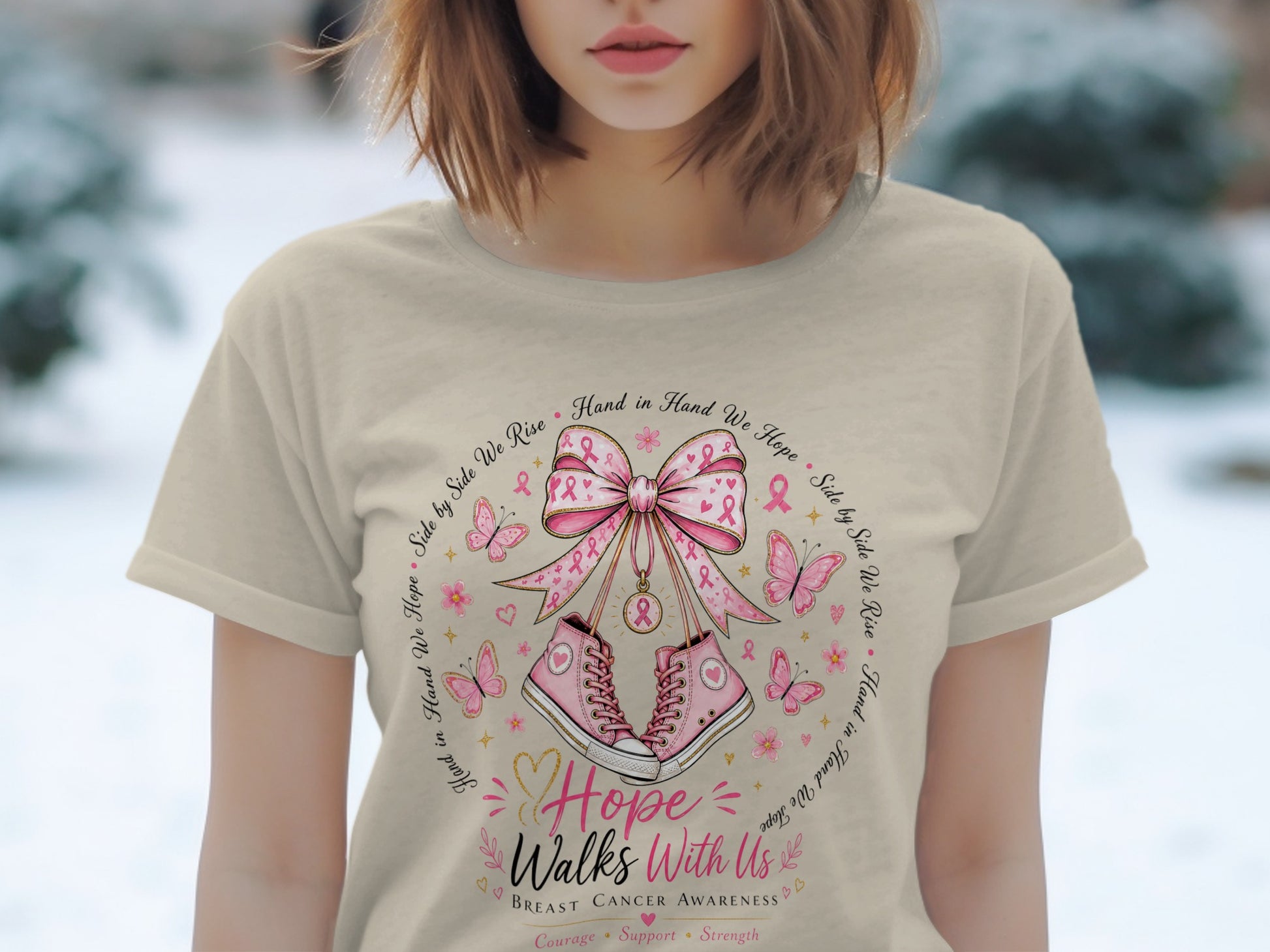 T-shirt with pink sneakers, bow, butterflies, and breast cancer awareness text.