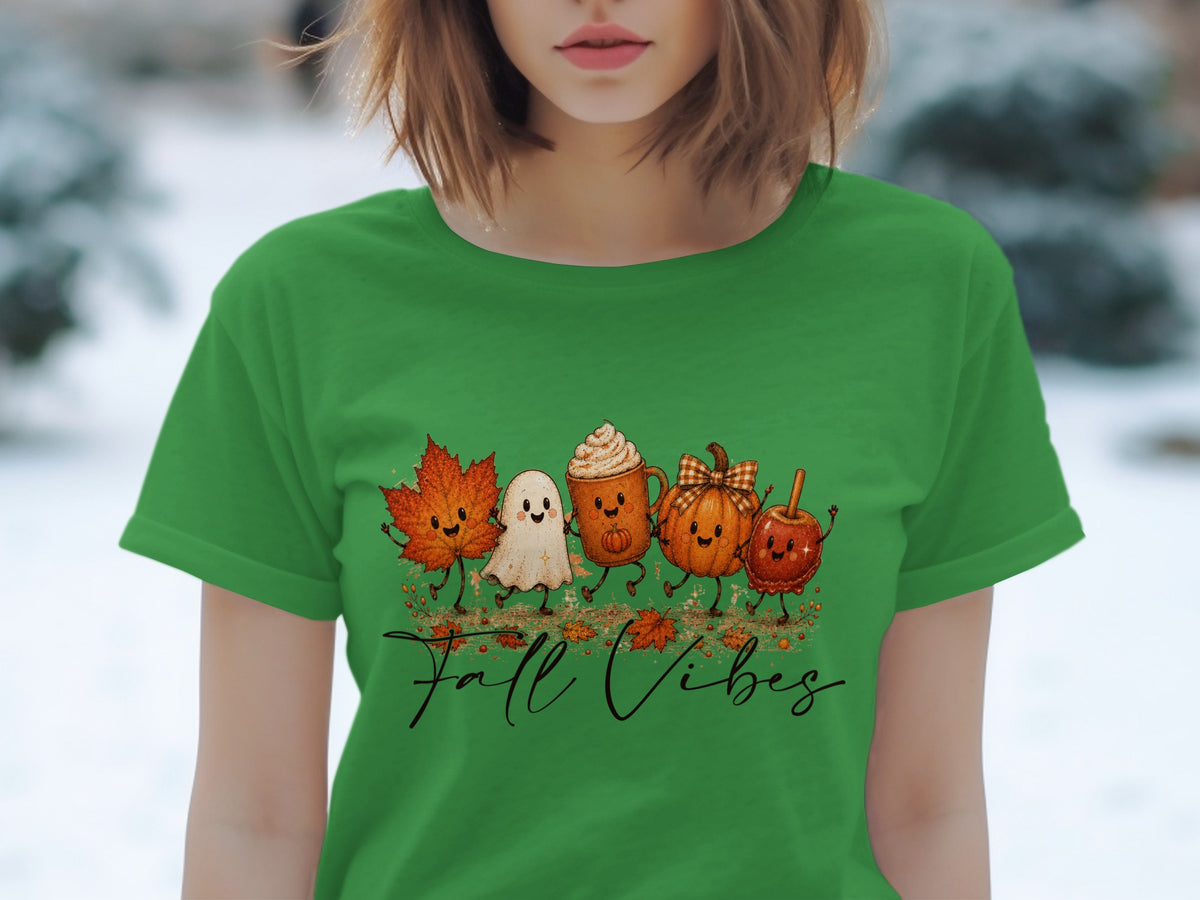 Green t-shirt with cartoon fall characters and text "Fall Vibes".