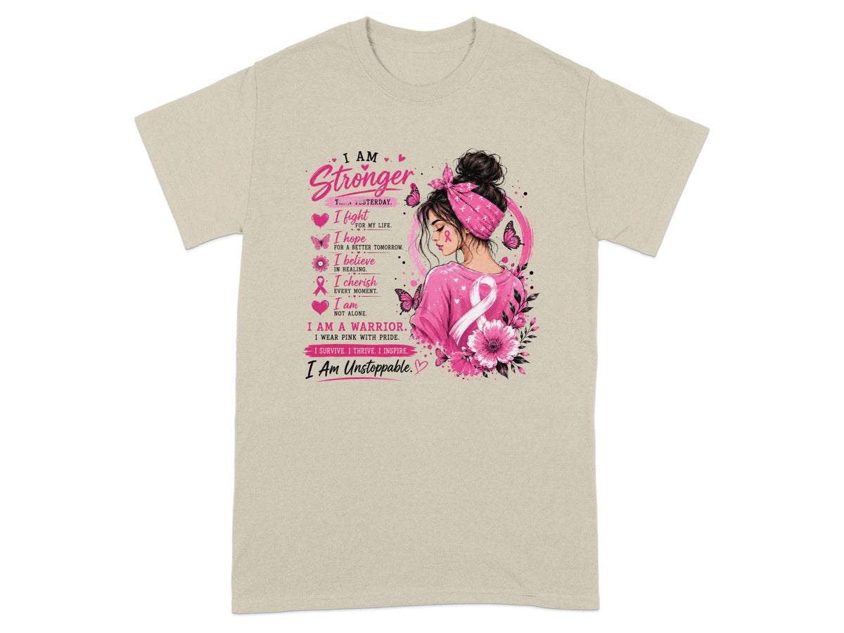 Beige t-shirt with "I AM Stronger Than Yesterday" and inspirational breast cancer awareness text.