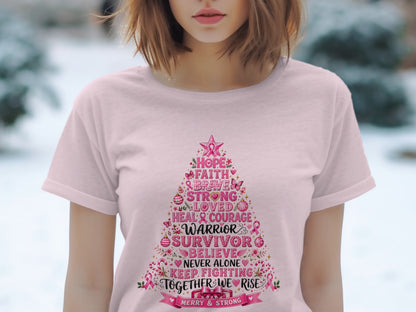 Pink t-shirt with Christmas tree graphic and breast cancer awareness messages.