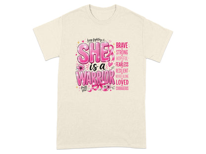 Cream t-shirt with "She is a Warrior" design and inspirational words.