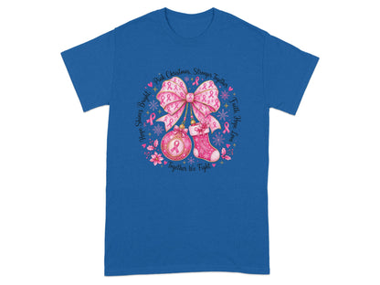 T-shirt with pink bow, ornament, stocking, and breast cancer ribbons.