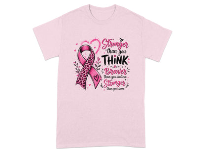 Pink t-shirt with leopard print breast cancer ribbon and "Stronger than you think, Braver than you believe, Stronger than you seem" text.