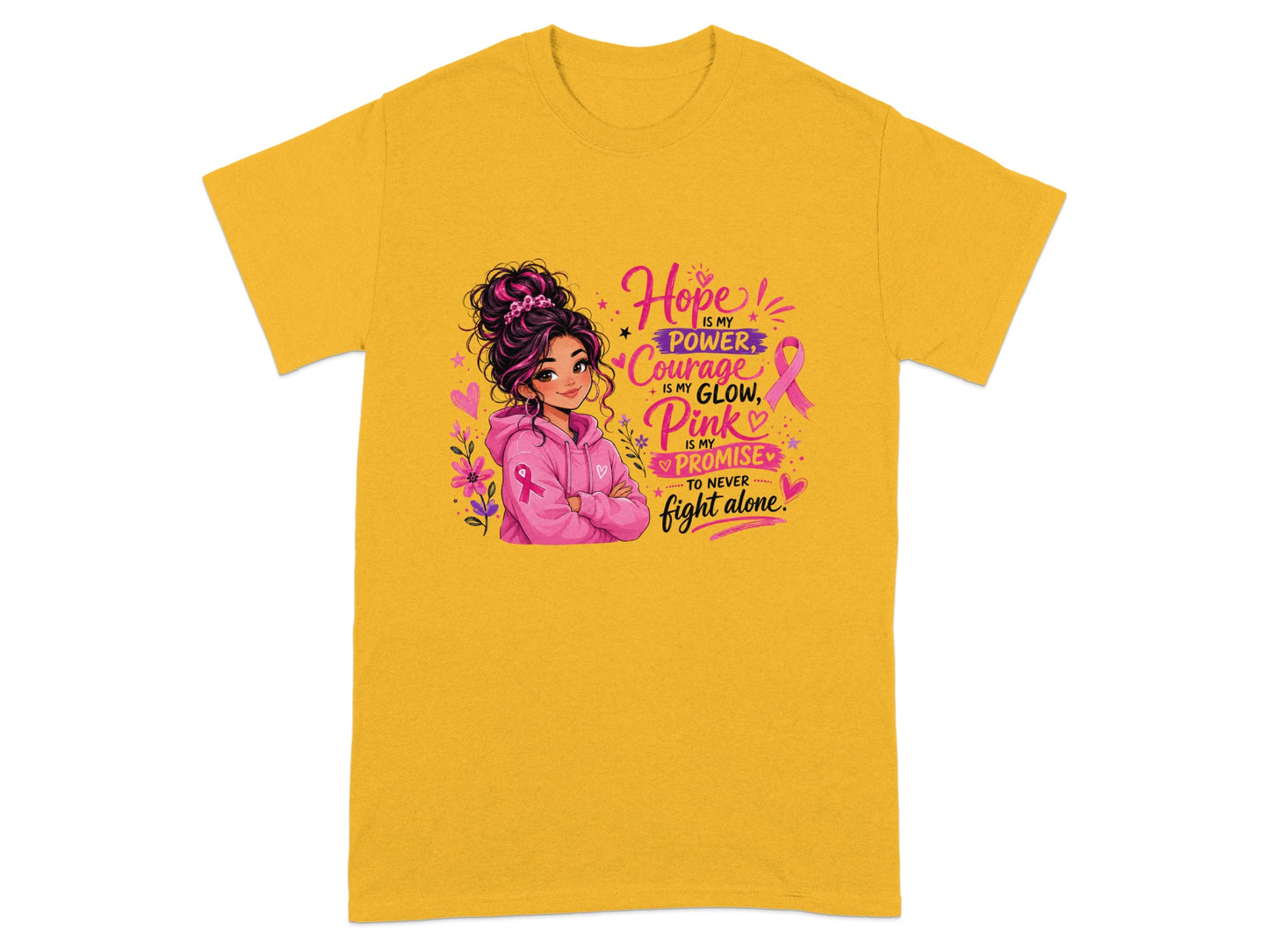 Yellow t-shirt with girl graphic and text "Hope is my power, Courage is my glow, Pink is my promise, to never fight alone."
