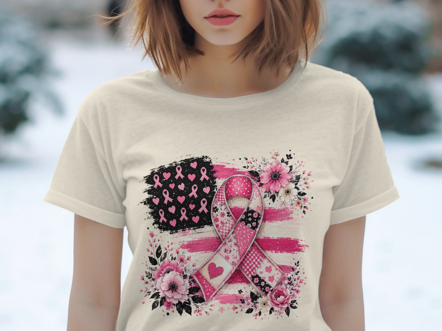 Cream t-shirt with a pink ribbon, floral, and American flag design.