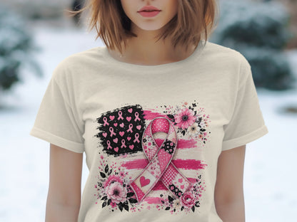 Cream t-shirt with a pink ribbon, floral, and American flag design.