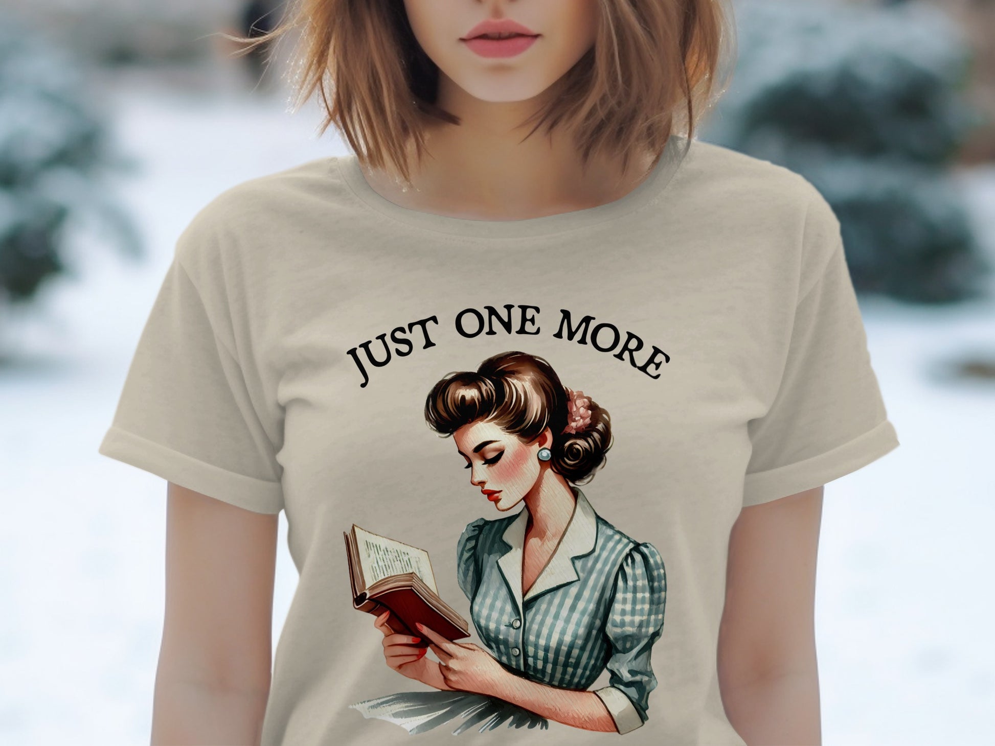 T-shirt with vintage woman reading, text "JUST ONE MORE"