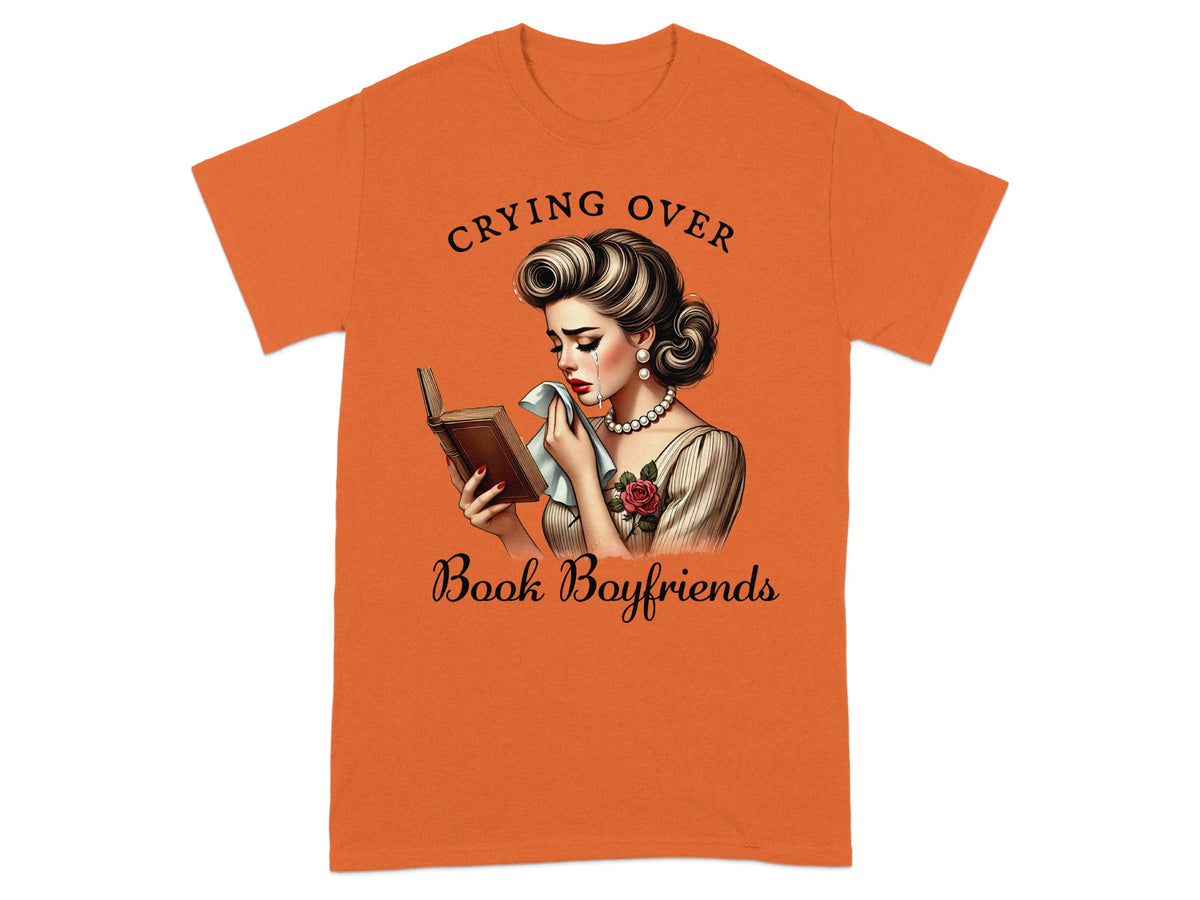 Woman crying over a book with text "Crying Over Book Boyfriends".