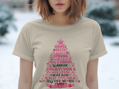 T-shirt with a Christmas tree design listing inspirational words for breast cancer awareness.