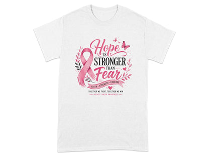 White t-shirt with pink ribbon and "Hope is Stronger Than Fear" breast cancer awareness graphic.