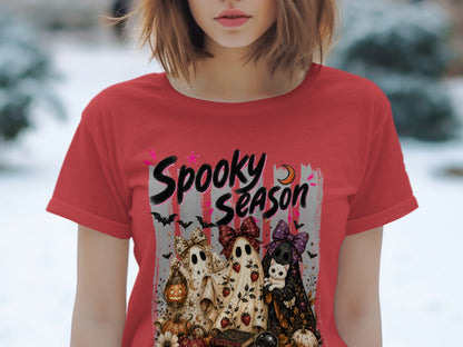 Red t-shirt with "Spooky Season" text and three ghosts with a cat and Halloween decorations.