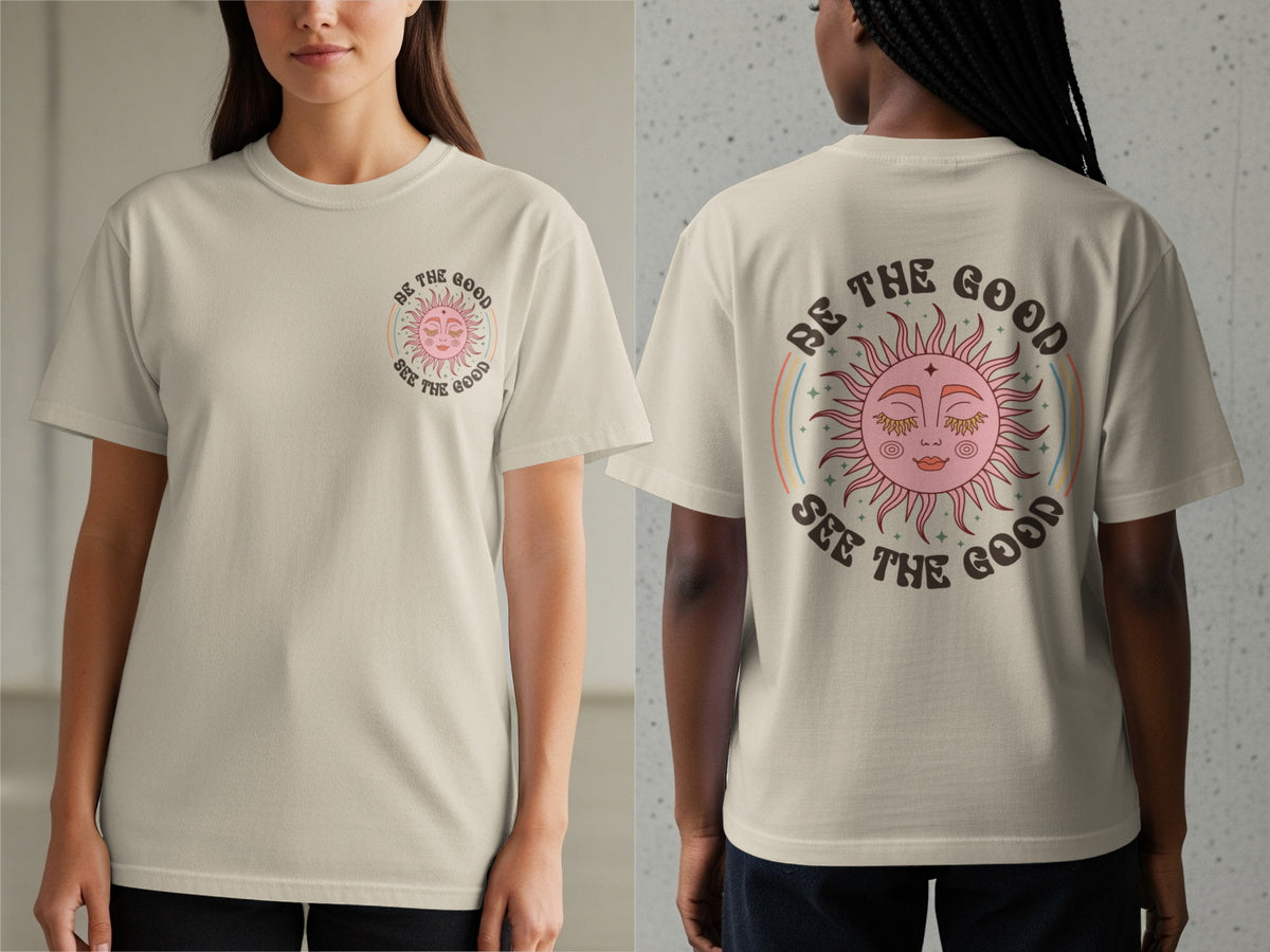 Beige t-shirt with a graphic of a sun and text "BE THE GOOD SEE THE GOOD".