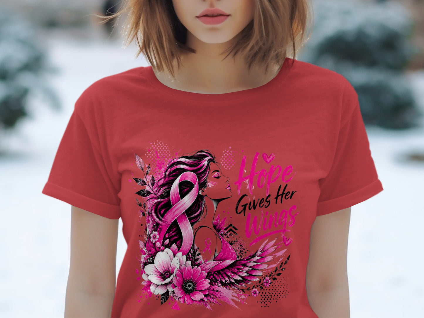 Red t-shirt with pink breast cancer ribbon, woman, flowers, and text "Hope Gives Her Wings".