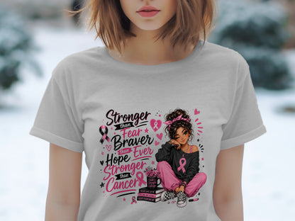 Girl with pink cancer ribbon design and "Stronger than Fear, Braver than Hope, Stronger than Cancer" text.