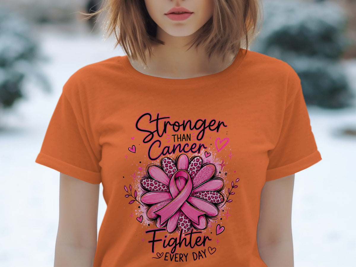 Orange t-shirt with "Stronger Than Cancer Fighter Every Day" and a pink ribbon.