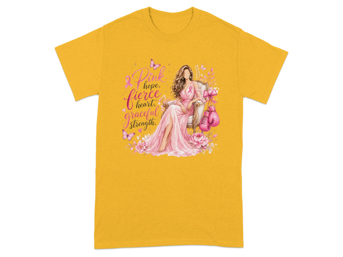 Yellow t-shirt with pink ribbon, woman, boxing gloves, and text "Pink hope, fierce heart, graceful strength."