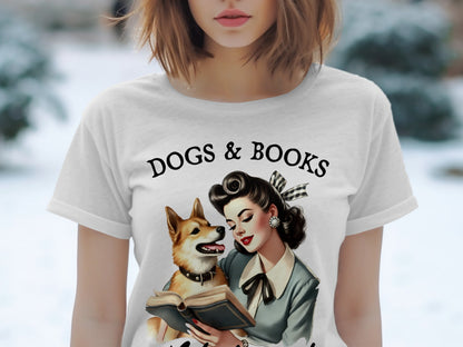 White t-shirt with "DOGS & BOOKS" text and vintage illustration of a woman and dog reading.