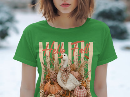 Green t-shirt with a goose, pumpkins, and fall foliage graphic that says "Hello Fall."