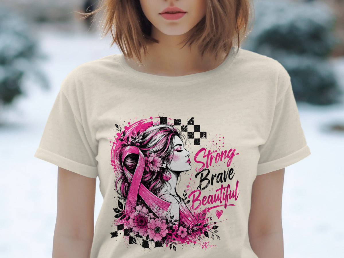 T-shirt with graphic of woman, pink ribbon, flowers, and text "Strong Brave Beautiful".