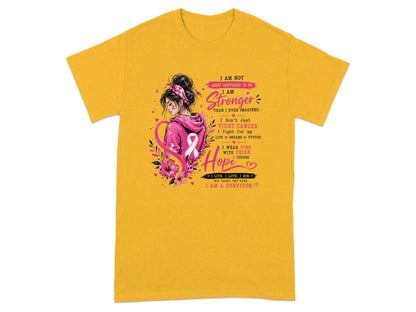 Yellow t-shirt with breast cancer awareness graphic and inspirational text.