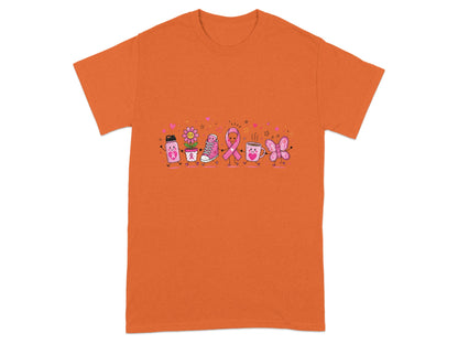 Orange t-shirt with cartoon characters including a water bottle, flower, shoe, ribbon, mug, and butterfly.