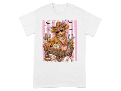 Cow with cowboy hat, heart sunglasses, sitting in a wagon with pumpkins.