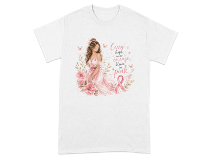 White t-shirt with graphic of woman, flowers, butterflies, and text "Carry hope, wear courage, bloom in pink".