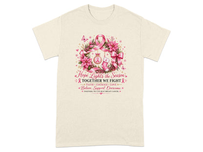 T-shirt with breast cancer awareness wreath, pink ribbons, and inspirational text.