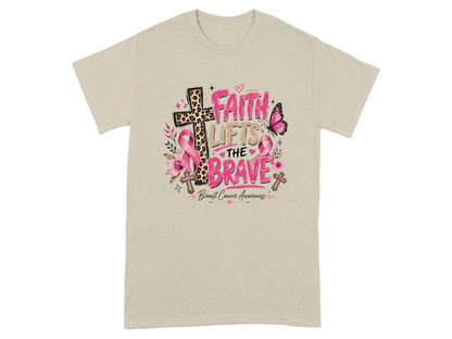 Faith lifts the brave, Breast Cancer Awareness graphic on a tan t-shirt.