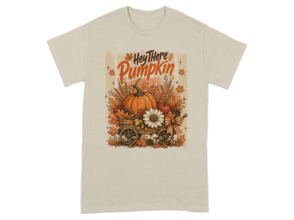 "Hey There Pumpkin" text above a wagon filled with pumpkins, flowers, and autumn leaves.