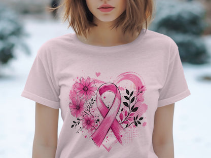 Pink t-shirt with breast cancer ribbon design and floral accents.